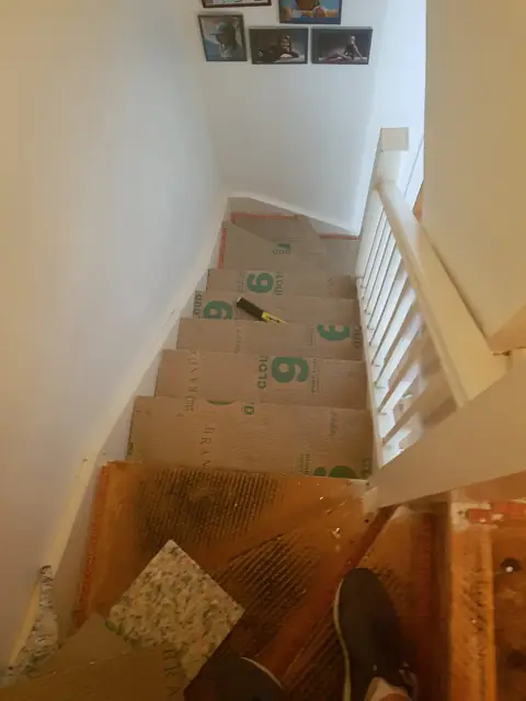 Old stairs stripped back for new carpet