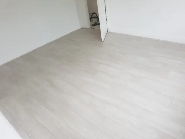 After: Bedroom refresh in grey laminate